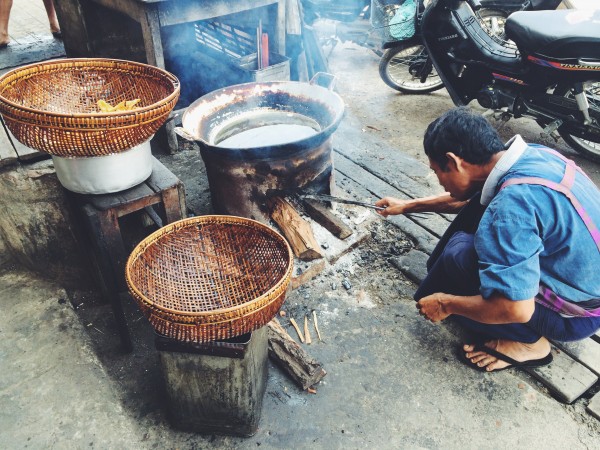 Making snacks on a simple stove, Myanmar, by Charlie Grosso